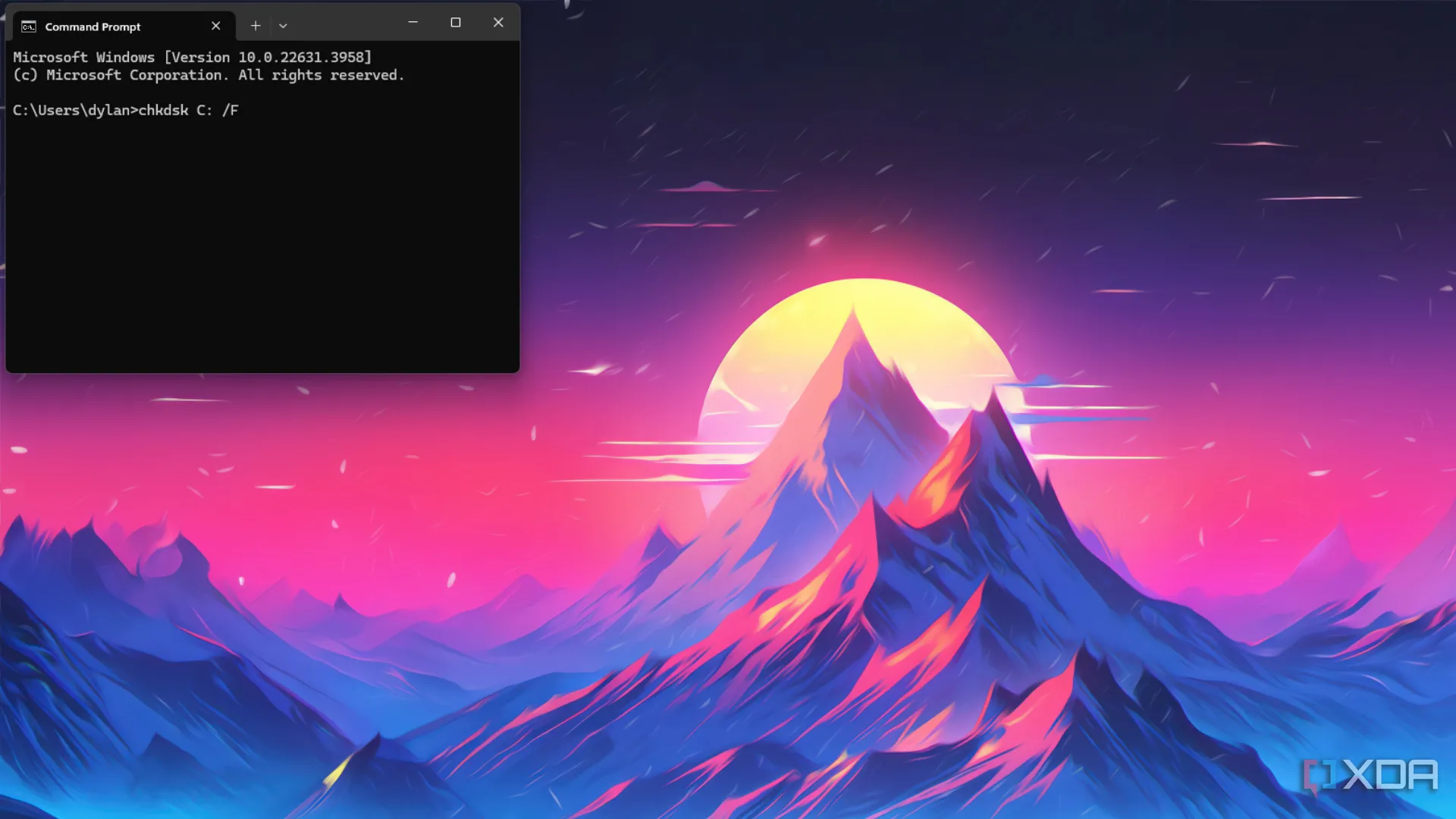 Cửa sổ lệnh CHKDSK đang chạy trên màn hình desktop Windows