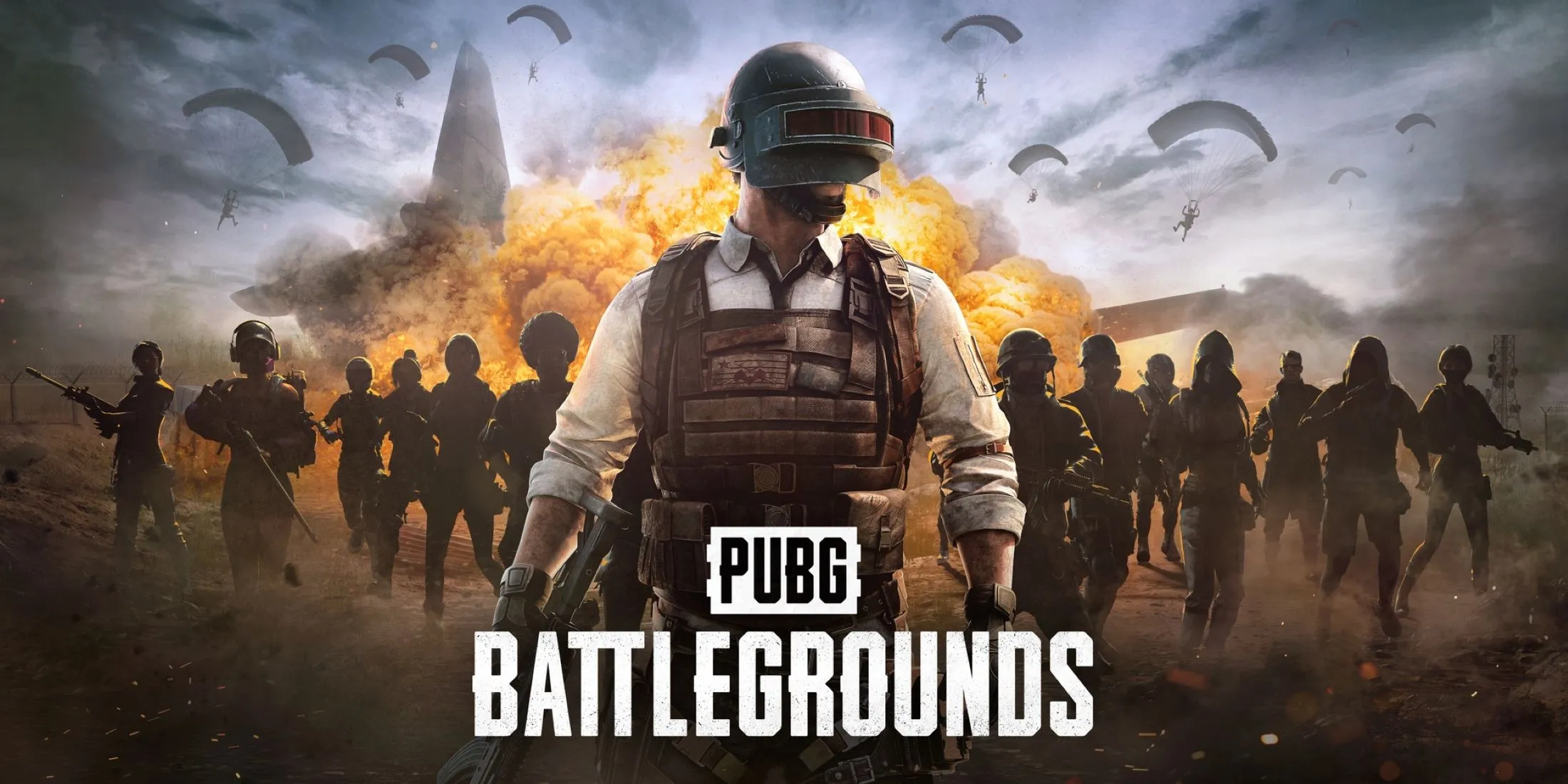 Ảnh bìa game PUBG Battlegrounds với các nhân vật sẵn sàng chiến đấu trong bối cảnh hoang tàn