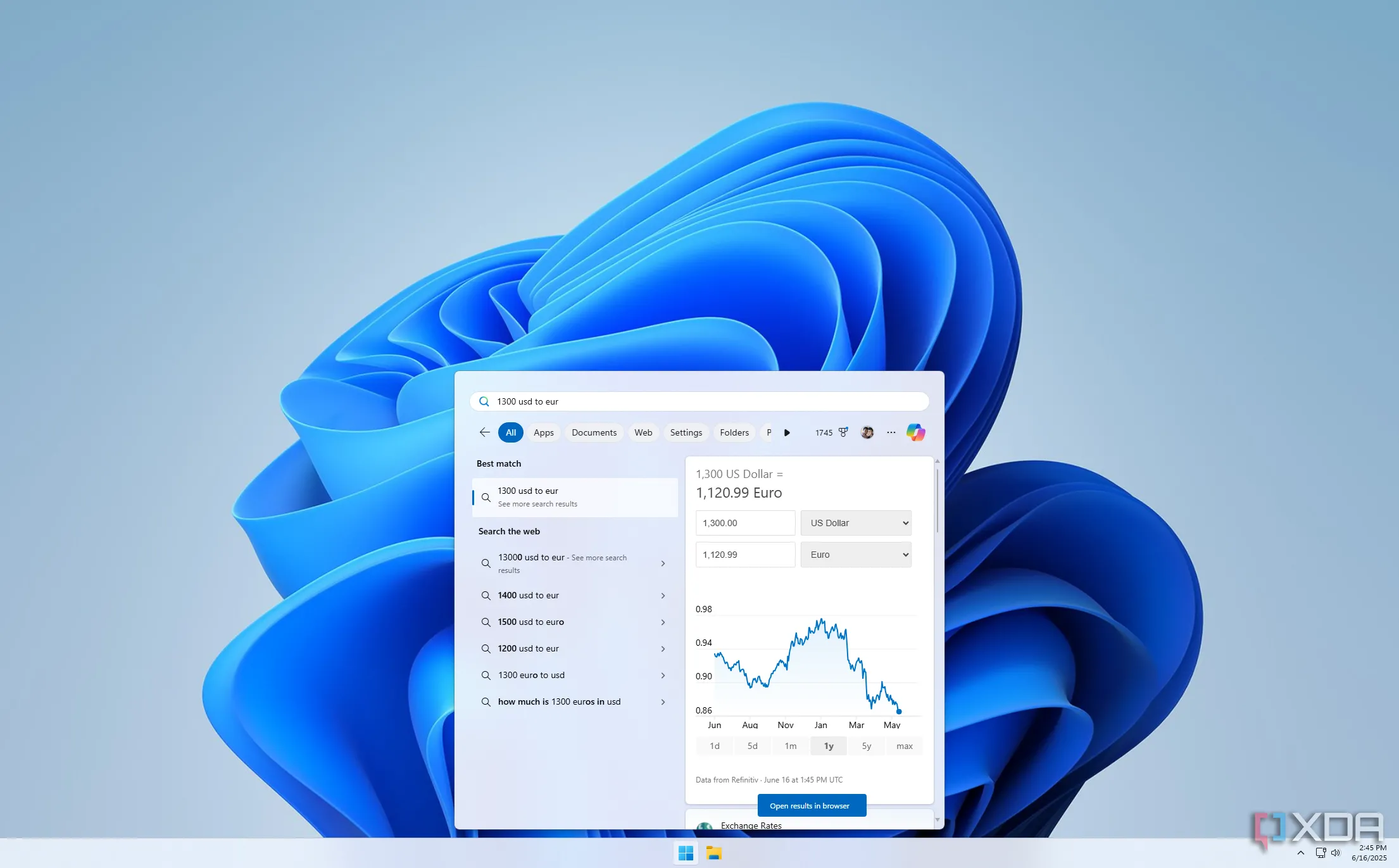 Ảnh chụp màn hình Windows 11 hiển thị kết quả chuyển đổi tiền tệ trực tiếp trong thanh tìm kiếm Start Menu