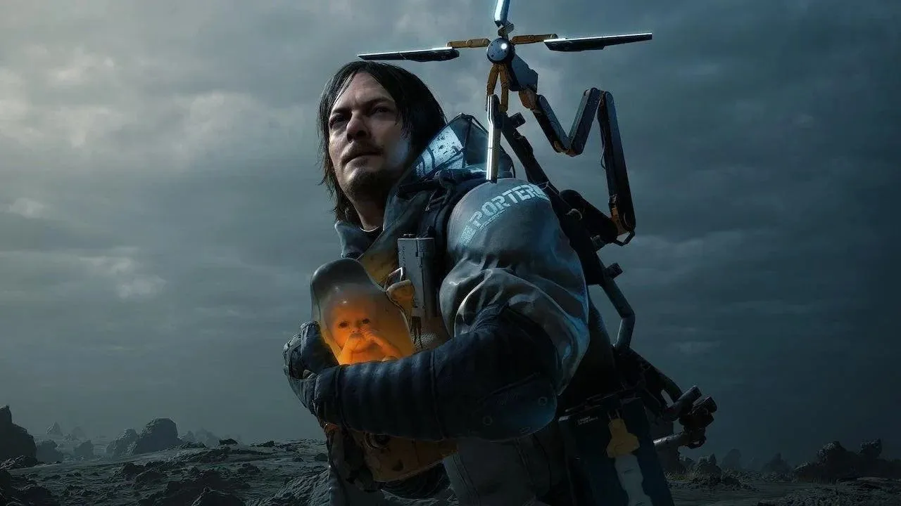 Bìa minh họa game Death Stranding với nhân vật Sam Porter Bridges ôm em bé BB