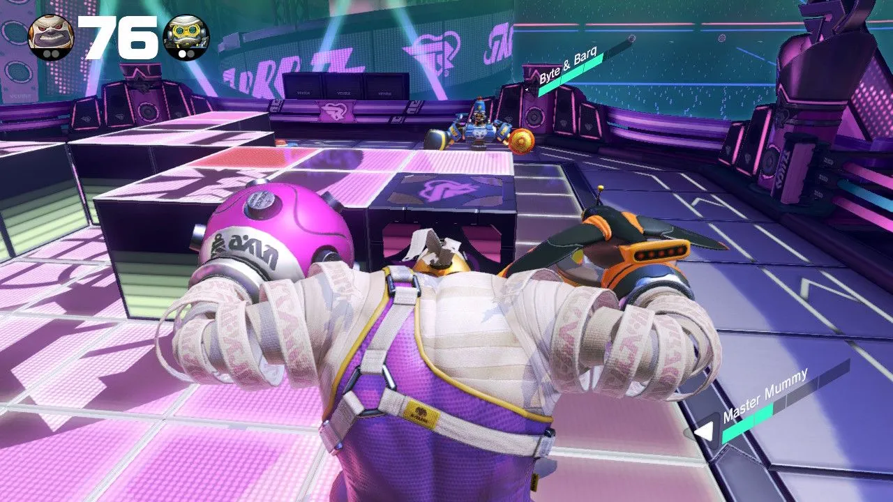 Cảnh chiến đấu trong ARMS trên Nintendo Switch, thể hiện cơ chế chiến đấu độc đáo với cánh tay kéo dài