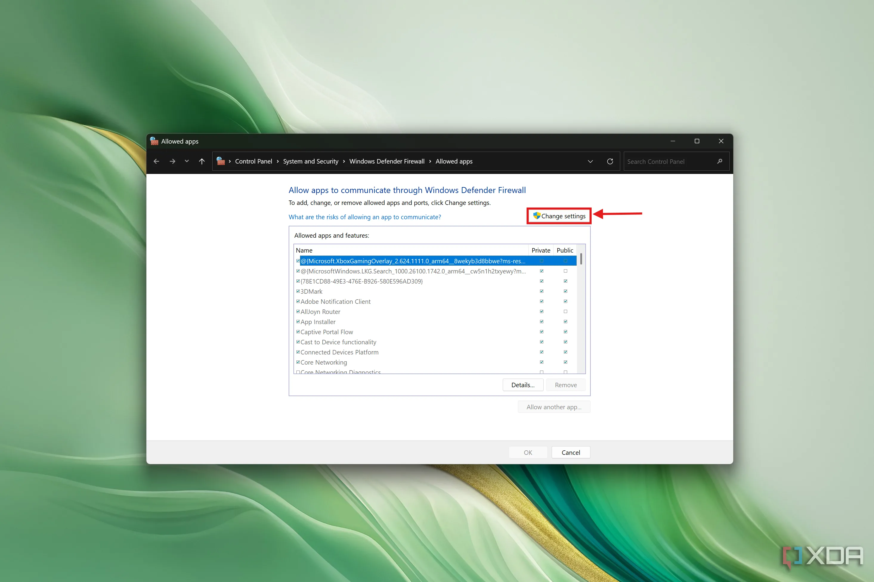 Danh sách ứng dụng được phép của Windows Defender với nút &quot;Change settings&quot; được làm nổi bật