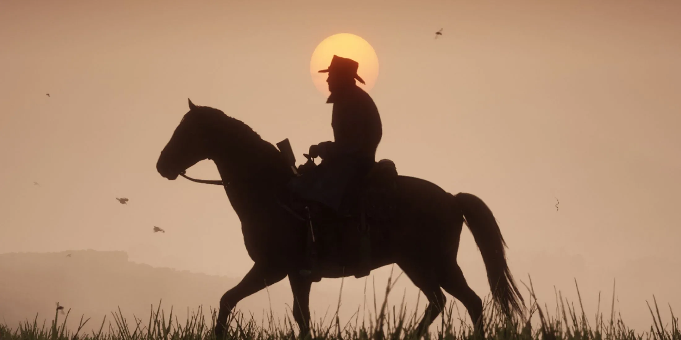 Hình ảnh bóng lưng của Arthur cưỡi ngựa trong Red Dead Redemption 2, tạo cảm giác huyền ảo và lãng mạn.