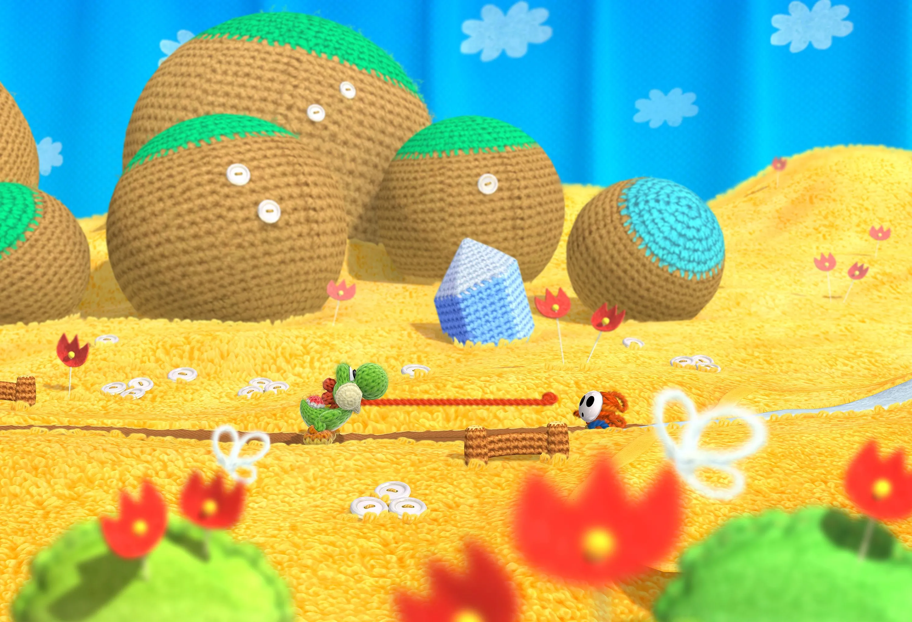 Hình ảnh game Yoshi's Woolly World trên Wii U, minh họa phong cách đồ họa len độc đáo