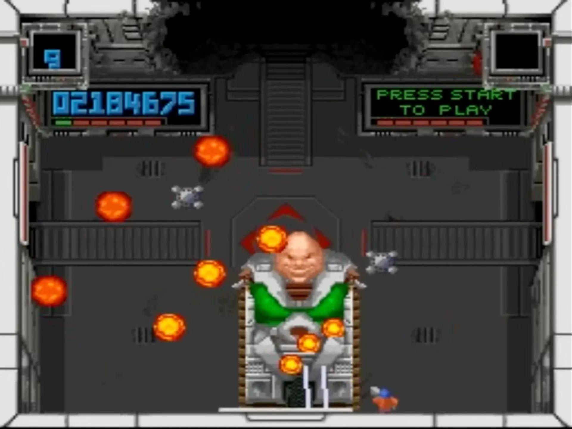 Hình ảnh gameplay của Super Smash TV, một tựa game bắn súng góc nhìn từ trên xuống trên SNES.