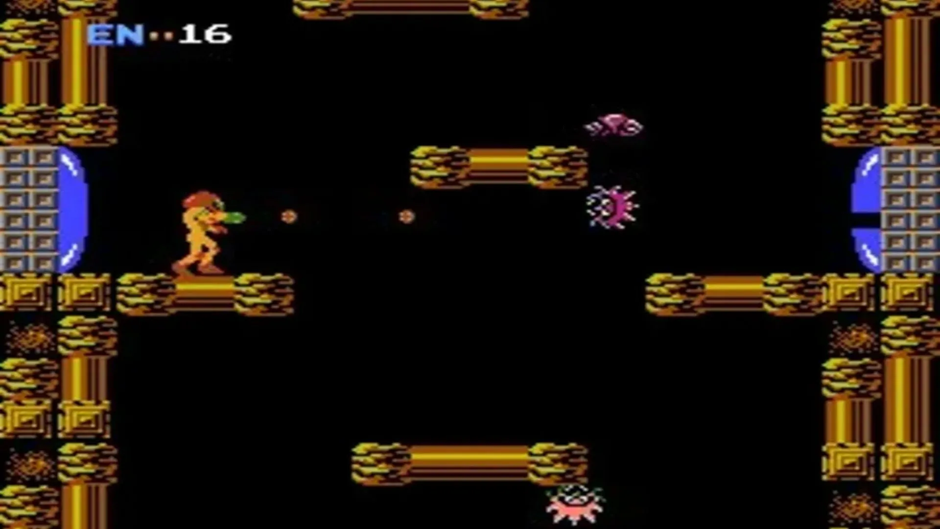 Hình ảnh gameplay từ game Metroid gốc (1986) trên NES, hiển thị Samus Aran trong hành động khám phá hành tinh Zebes.