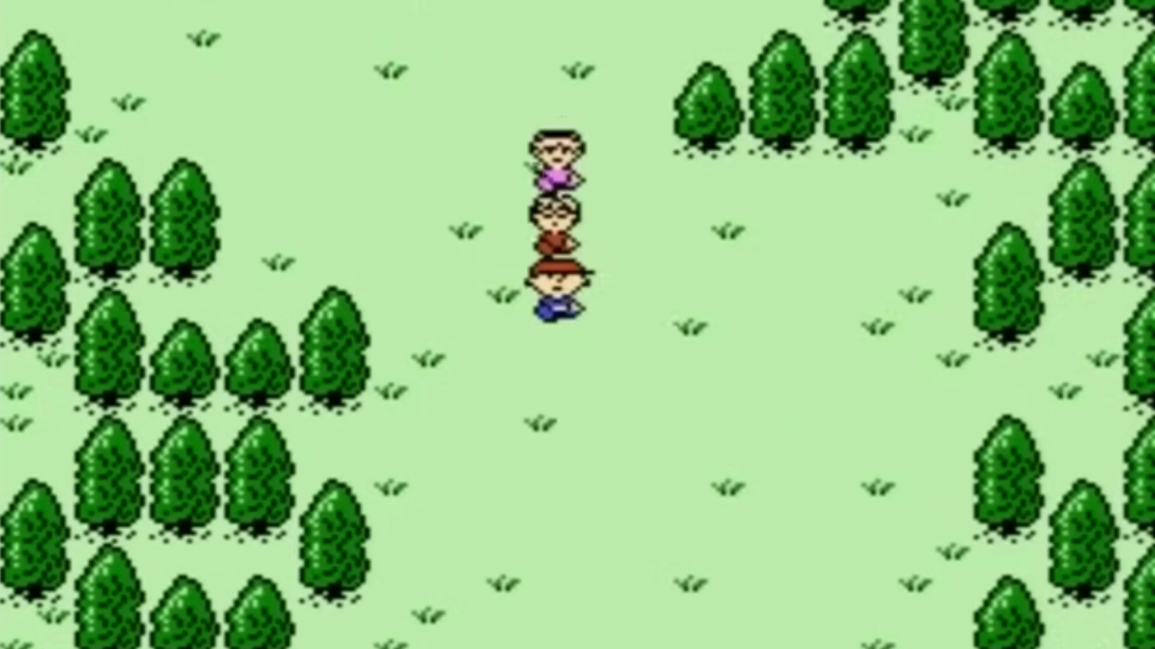 Khung cảnh thị trấn hoặc địa điểm khám phá trong Earthbound Beginnings, thể hiện phong cách đồ họa pixel của NES.