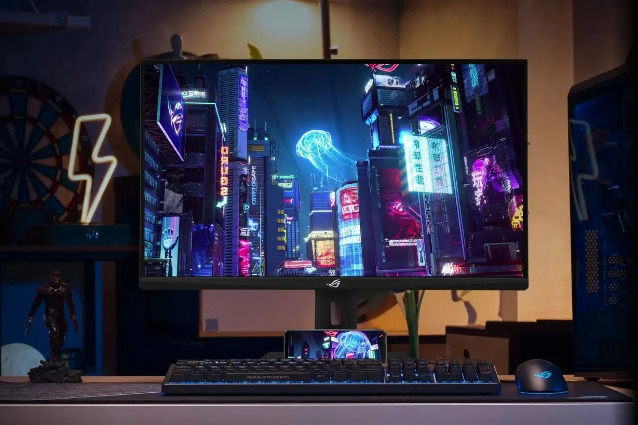 Màn hình Asus ROG Strix XG27UCG với chuột và bàn phím chuyên game trên bàn làm việc