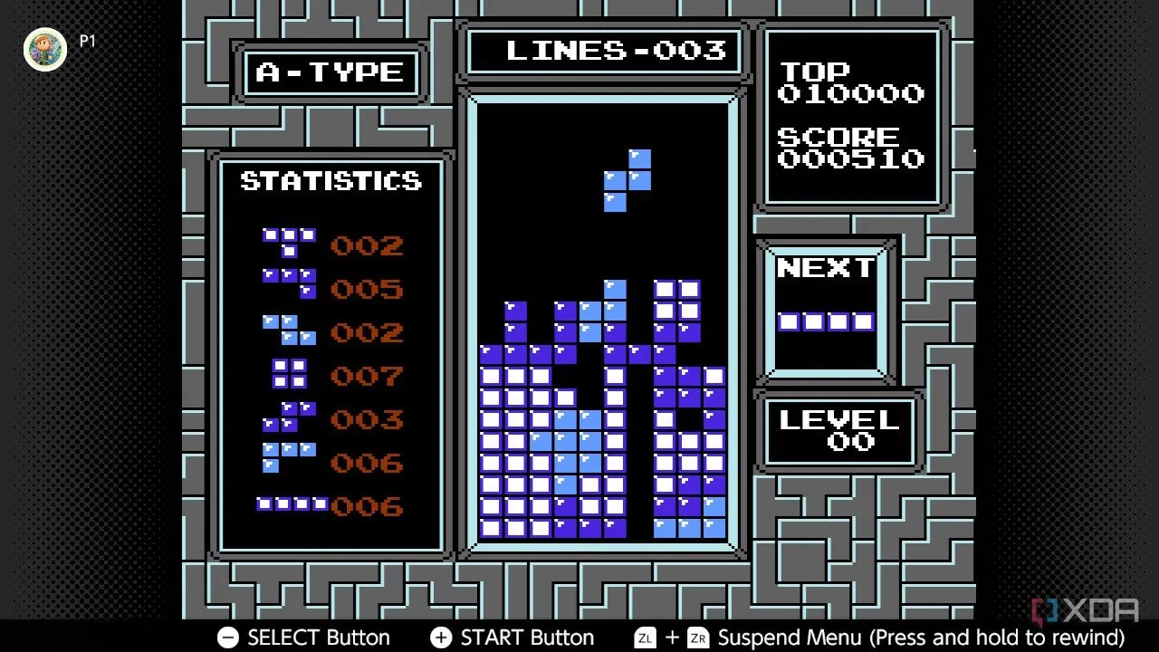 Màn hình gameplay của Tetris trên NES, hiển thị các khối gạch rơi xuống