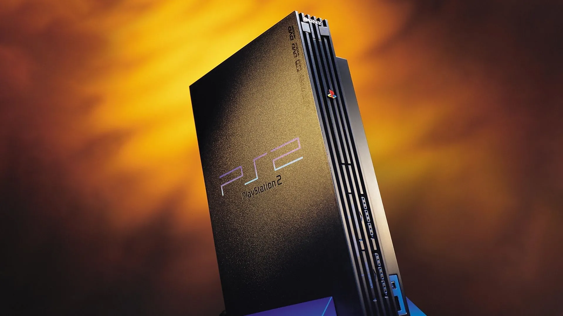 Máy console PlayStation 2 màu đen với tay cầm DualShock 2, biểu tượng game kinh điển