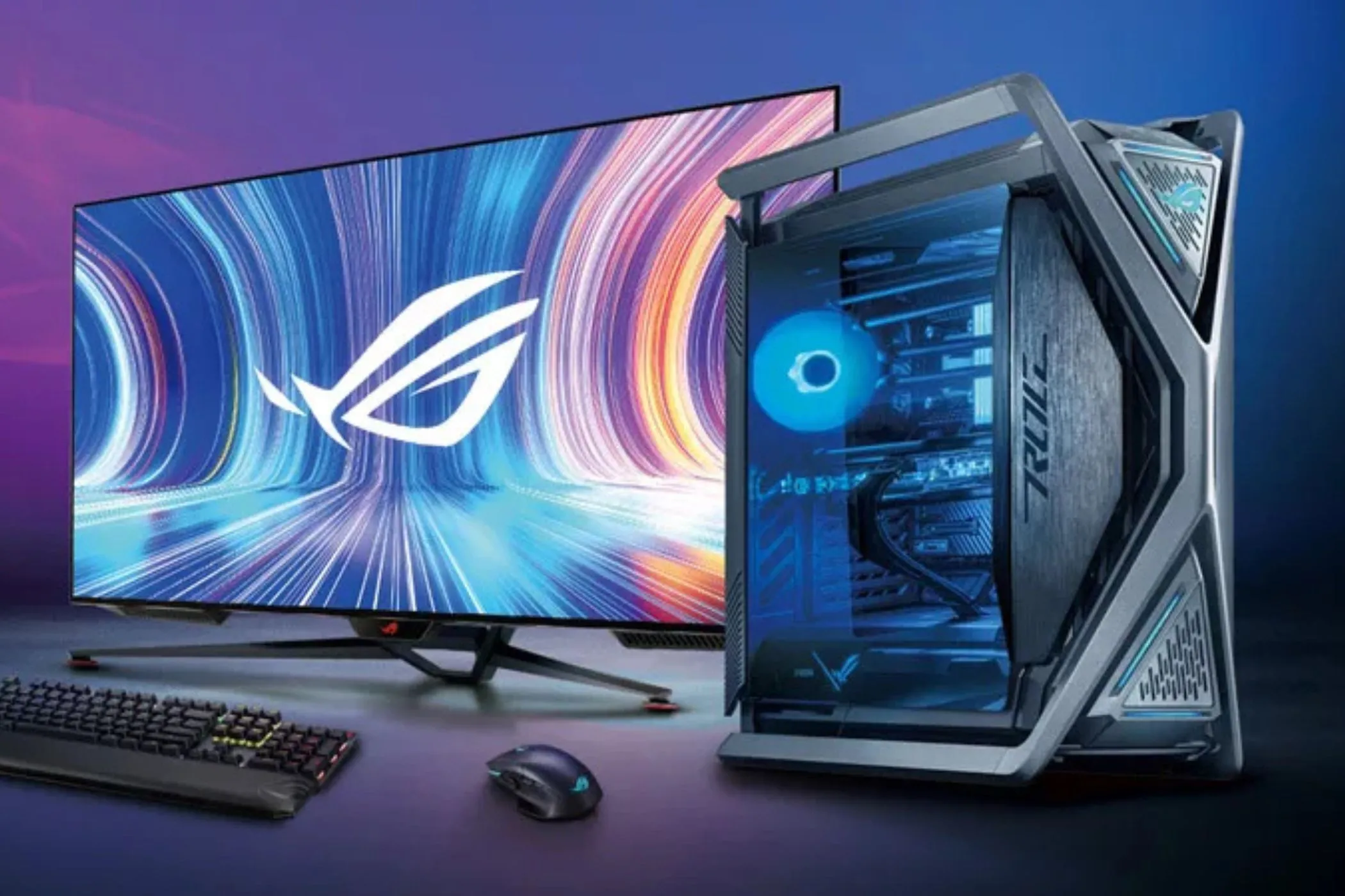 Máy tính chơi game PC với màn hình và bàn phím trên bàn, minh họa chi phí cao của PC gaming