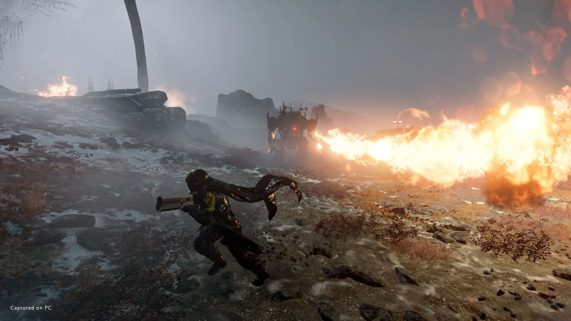 Mech (người máy) của Helldivers 2 phun lửa dữ dội, tiêu diệt kẻ thù trên chiến trường.