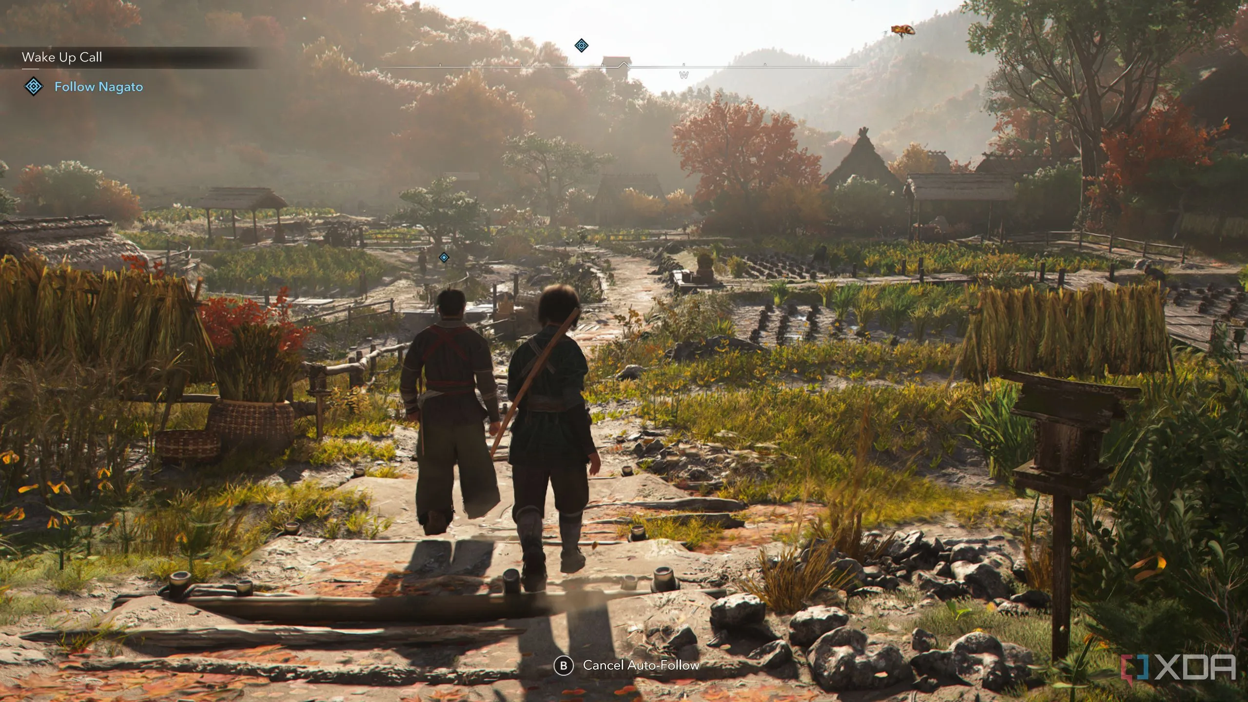 Naoe đi theo cha mình, ẩn mình giữa những người dân trong Assassin's Creed Shadows